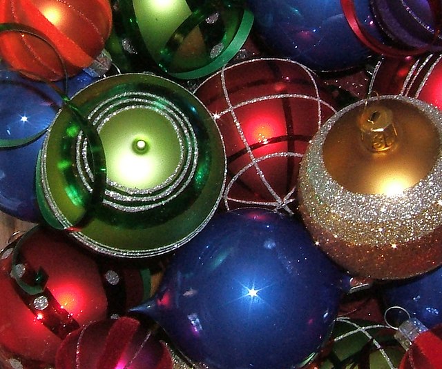 Holiday ornaments used to symbolize a common Christmas tradition of decorating a tree