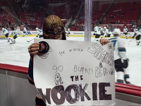 Christian Helfrich at Carolina Hurricanes game. The poster is made to root on Brent "The Wookie" Burns.