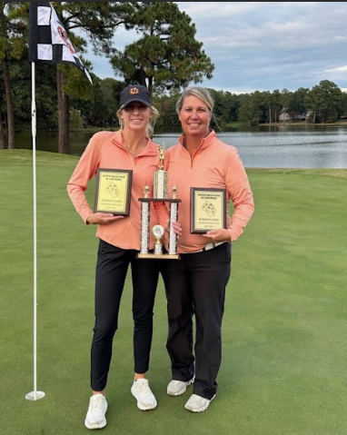 Fuqay Varinas High School golf team finishes strongly, ending with their coach gaining the title of the Greater Neuse River Conference Coach Of The Year For Women’s Golf. Kaitlynn Barnes(left) and Connie Barnes(right), credited to Evelyn Walters.