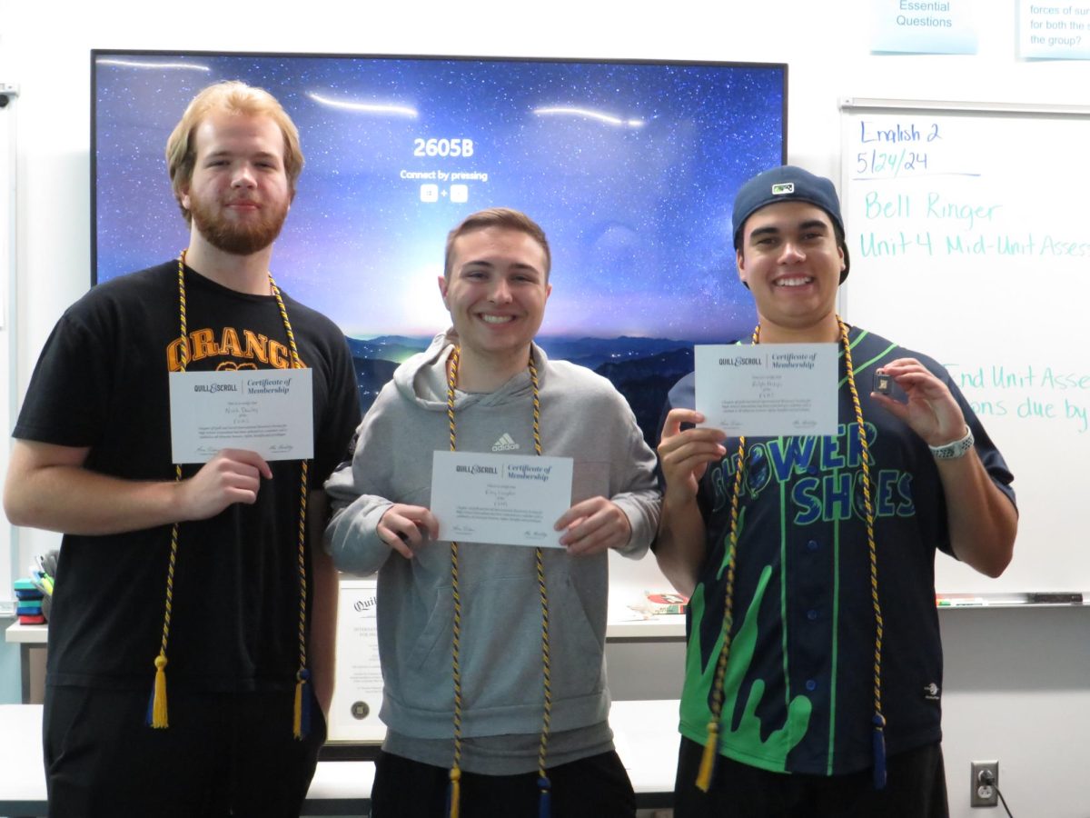Noah Dawley, Riley Congdon, and Ralph Philips recently got accepted into the honor society for student journalists.