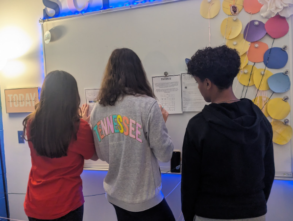 Hadley Gump, Murray Buddin, Djihed Bahri work on a project in science teacher Trista Schoop’s class. 