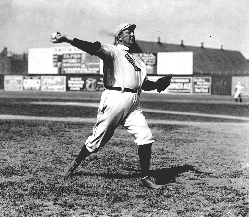 Cy Young, pitcher with the Boston Red Sox warming up before a game, circa 1900s.