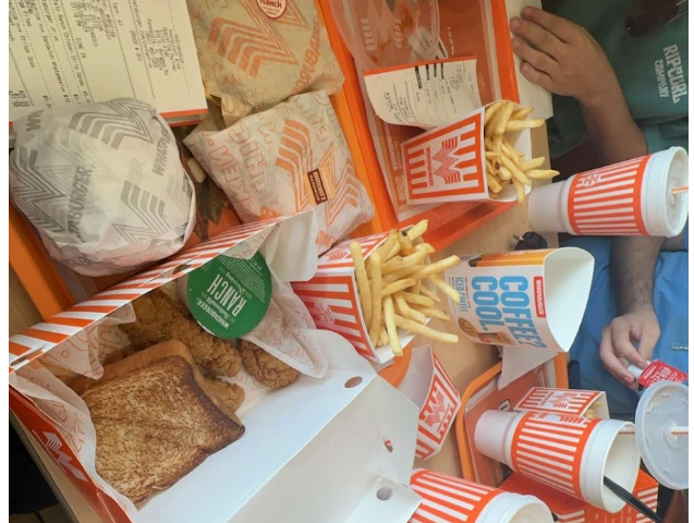 A Whataburger meal shared between friends.