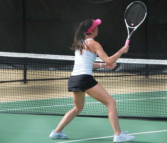 Senior Brittain Verdier, the team captain, locks in during a match.