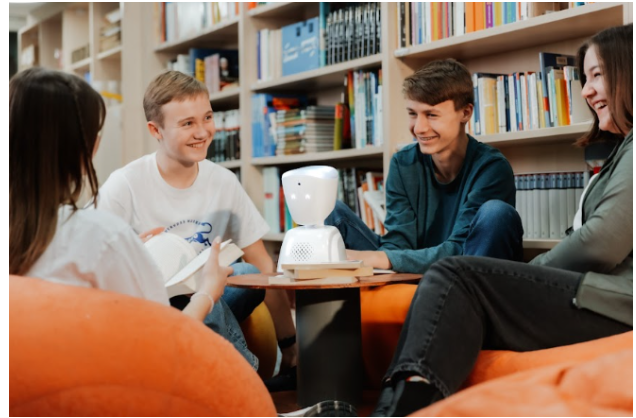 These students are reading with the AV1 robot which lets a student join the classroom from afar.