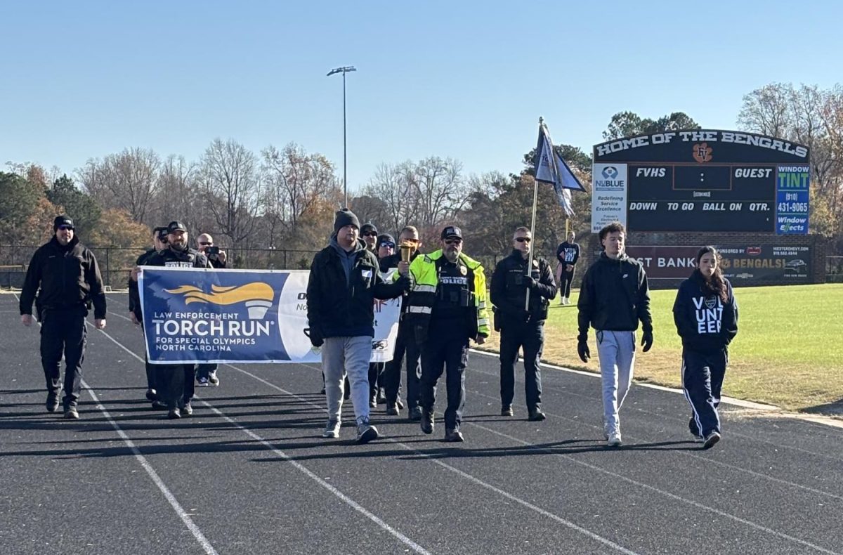 It's a tradition for law enforcement to come to the school hosting Special Olympics and carry the eternal flame. Photo by Halie Gallagher