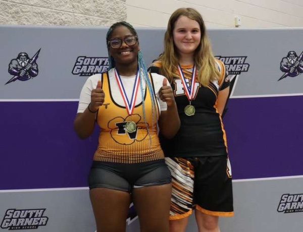 Senior Miazion Warren and freshman Kaitlyn Hatt won first place in their weight classes at the conference tournaments this past weekend. 

