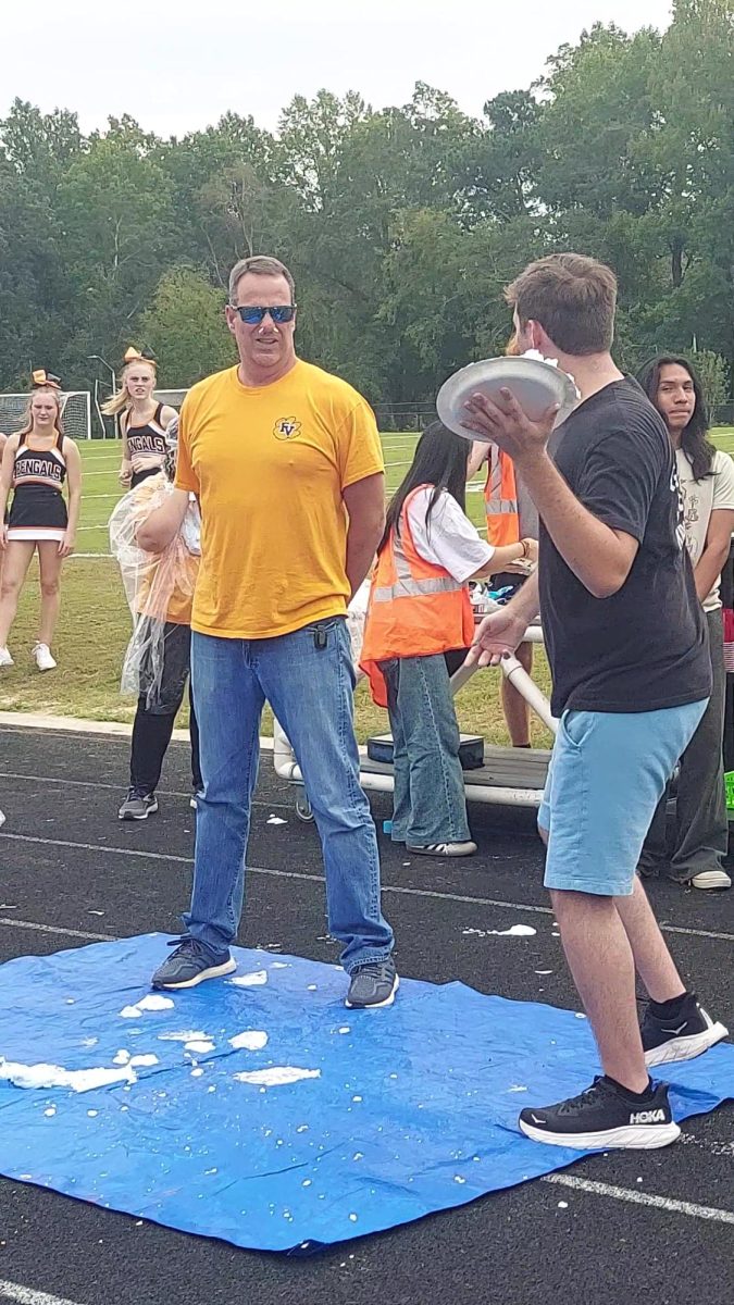 Student council creates fun events, like throwing pies in teachers' faces at the pep rally.