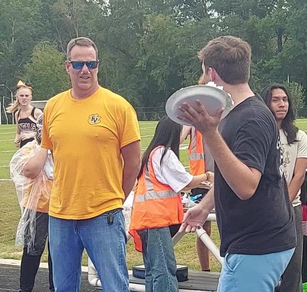 Student council creates fun events, like throwing pies in teachers' faces at the pep rally.