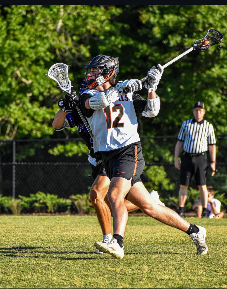 Senior Connor Everett scores on Cornith’s goalie Maximus Gladwell. 

