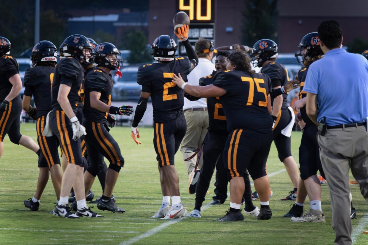 FVHS Bengals celebrate after winning against Apex on Aug. 28.

