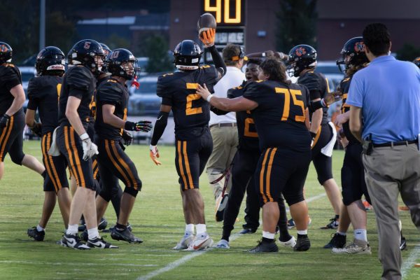 FVHS Bengals celebrate after winning against Apex on Aug. 28.

