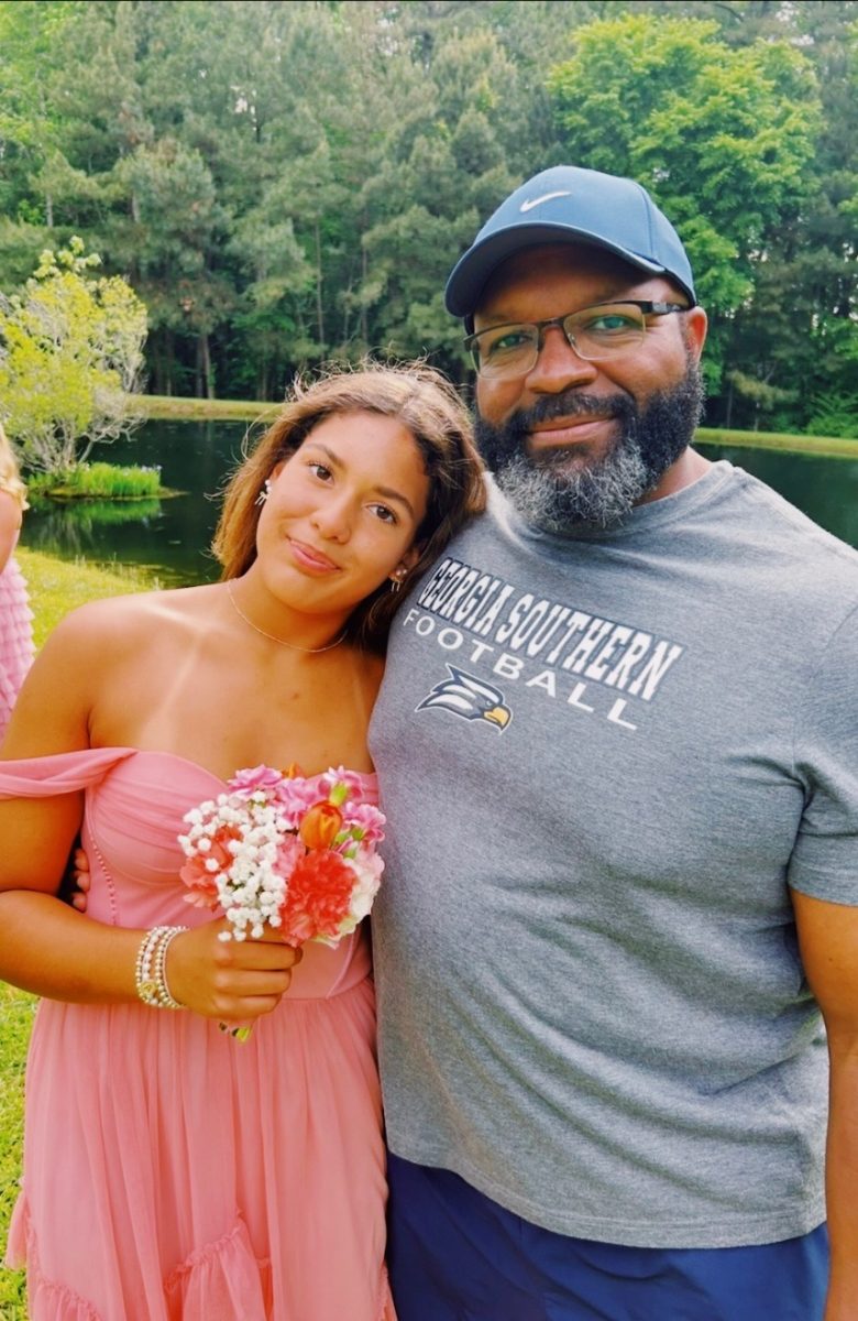 Harrington shares a special moment with his daughter Aevri.