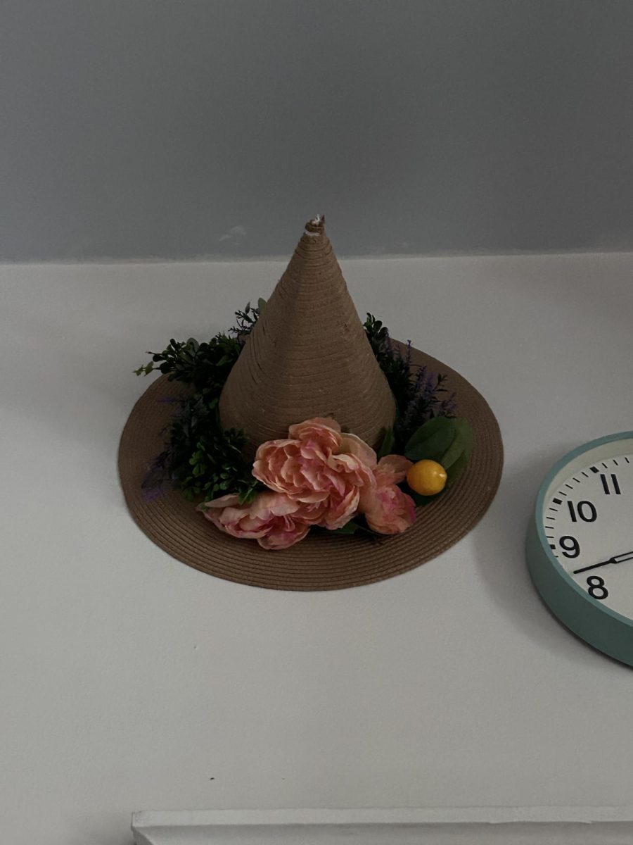 This handmade witch hat with decorative flowers was created by Liz Z Pardue. 