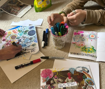 Teenagers create collages. 