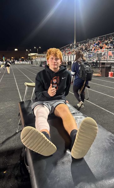 Senior football player Henry Minogue goes out with an ACL tear in his junior year season. Despite being sidelined, he stays involved with his team and works toward getting back on the field.