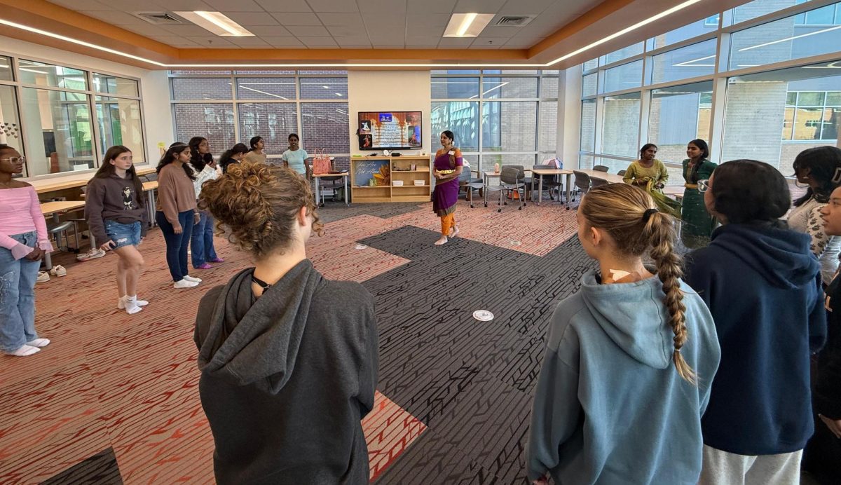 WHOA members and students participating in learning the dance form. 