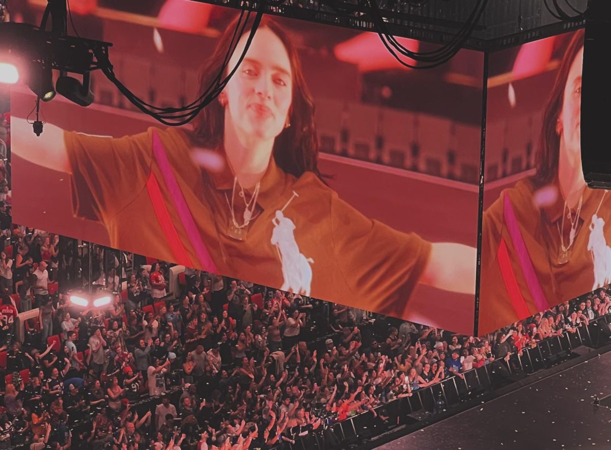 Billie Eilish bowing to the crowd during the closing song “Birds of a Feather.”