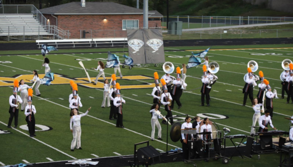 The Marching band plays on the Montgomery Central High field.