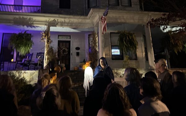 Local ghost tour patrons gather outside the Ballentine-Spence house in Fuquay-Varina.