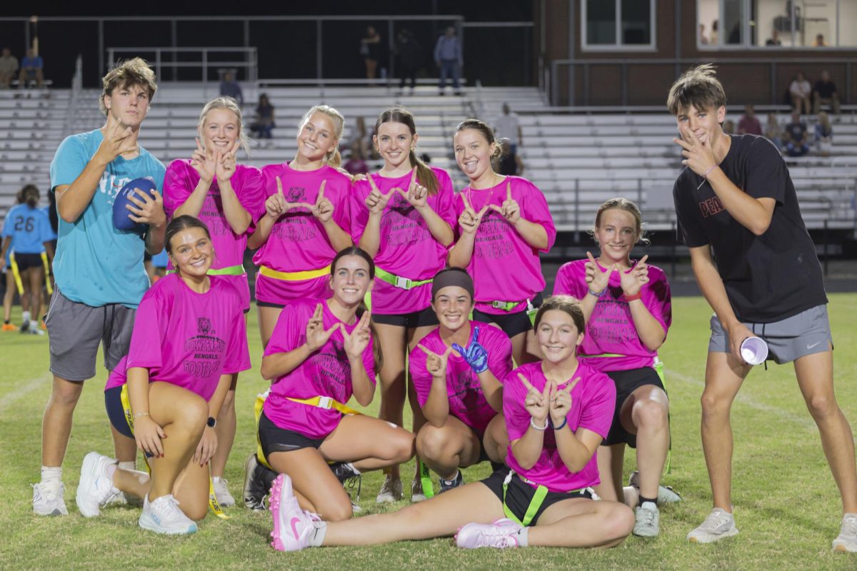 The junior team celebrates their hard-fought win.
