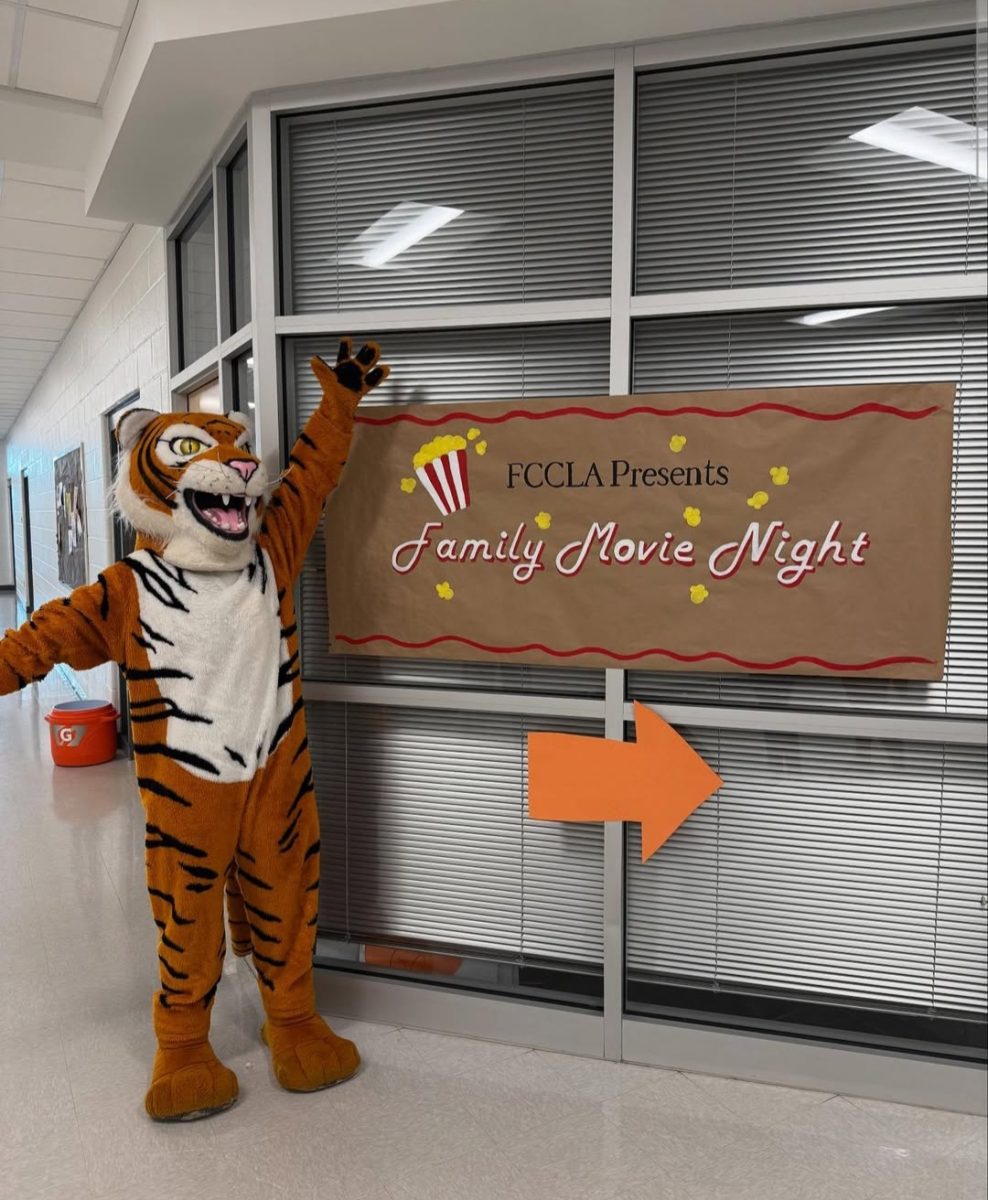 Benny the Bengal welcomes movie night attendees during last year’s event. Photo by Julia McClannon.