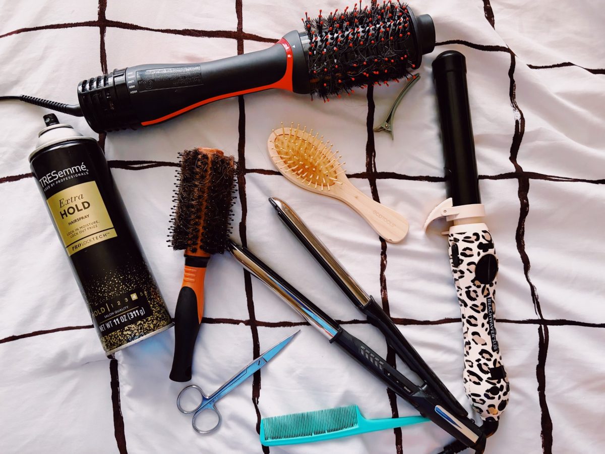 Hair brushes and styling tools represent the hair salon environment.