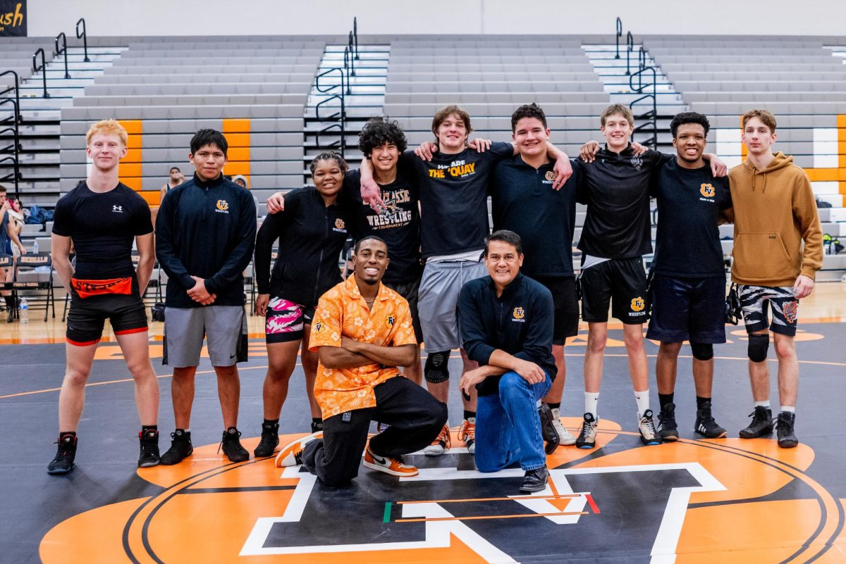 FVHS senior wrestlers pose together on senior night, celebrating their years of dedication and leadership on the mat.