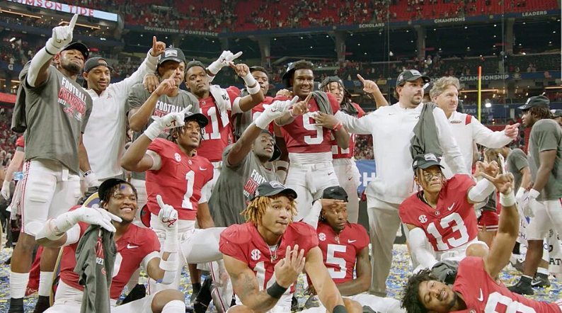 Alabama celebrates their 2021 SEC Championship victory in their classic uniforms. Photo courtesy of the University of Alabama.