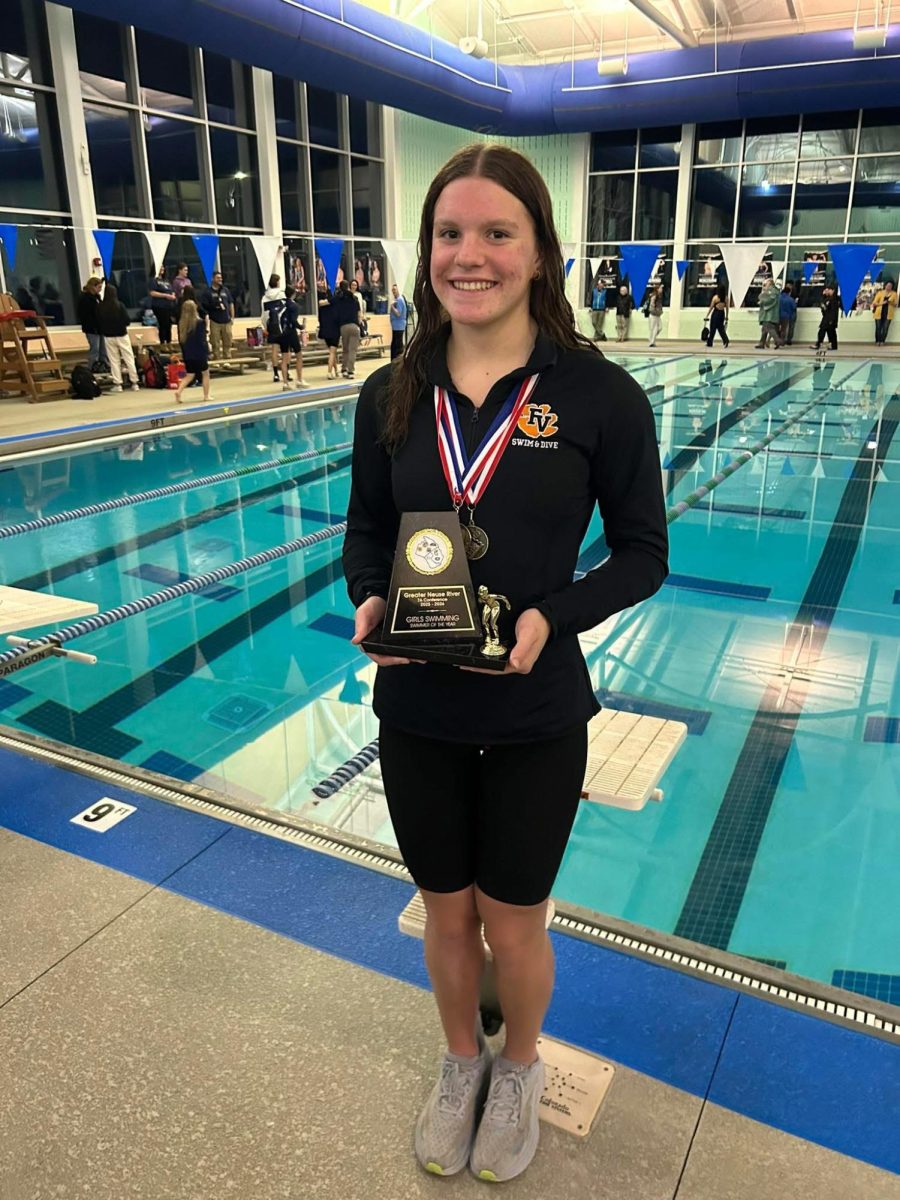  Sophomore Murray Buddin won this year's Greater Neuse River Conference Swimmer of the Year award.