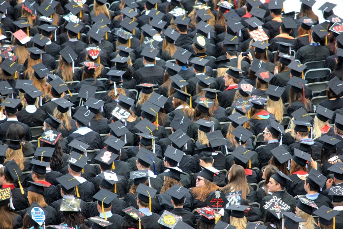 Graduating students don their honorary cap and gowns, ready for life after high-school.