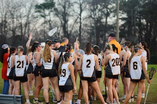 The Fuquay-Varina womens lacrosse team celebrates after another big playoff win. The Bengals defeated their opponent 19-4 in the third round and will now face the Topsail Pirates in the fourth round of the playoffs.